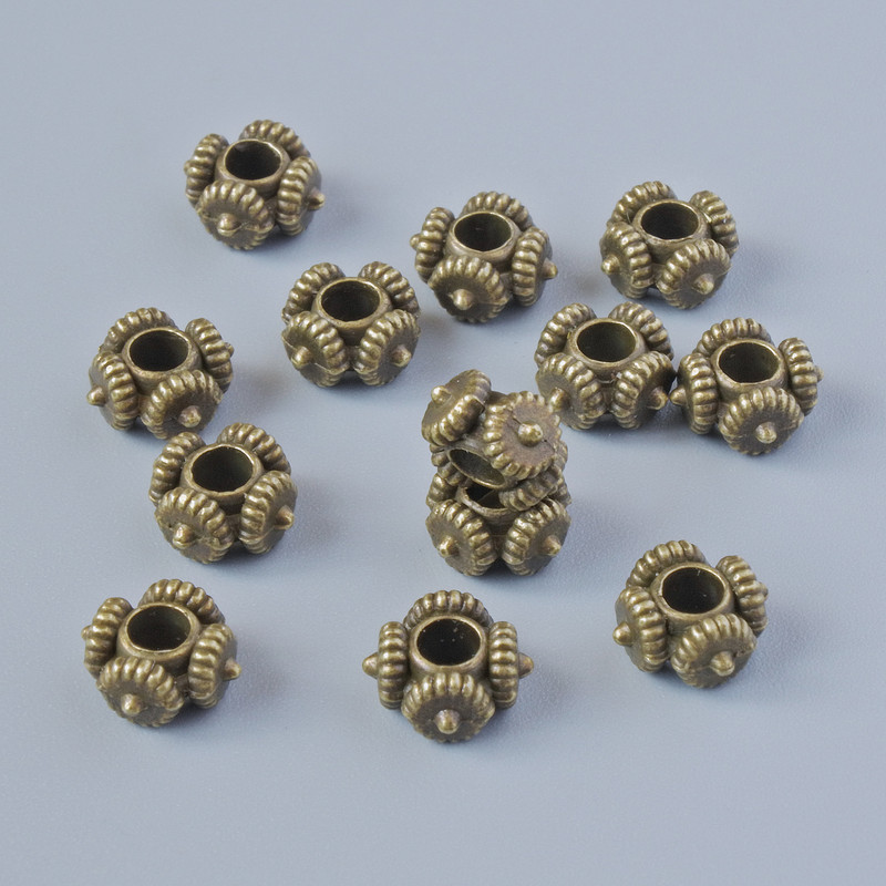 Einlagenperle, Abmessungen 7,5 × 4 mm, Lochdurchmesser 2,6 mm, Verpackung ca. 13 Stk, bronzefarbenes Metall