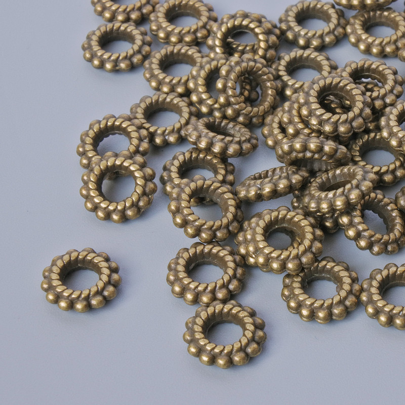 Perleinsatz – Durchmesser 7,5 × 2 mm, Lochdurchmesser 3,3 mm, Packung 54 Stück ± bronzefarbenes Metall