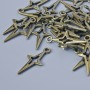 Anhänger 'Stern', Maße 23 × 10 mm, Lochdurchmesser 1,6 mm, Verpackung: ca. 30 Stück, bronzefarbener Metallton