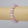 Armband aus Kunzit, naturstein, facettierte Rondellen, Durchmesser ca. 10×7 mm, Länge ca. 18 cm, elastisch, mit Metall-Einlagen