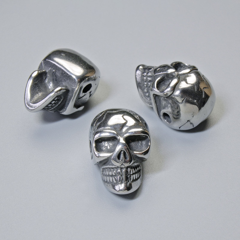 Einlegeperle 'Schädel', Durchmesser 14 × 9,5 mm, 5 mm ±, Bohrung Ø 1,8 mm, silberfarbenes Metall, 1 Stück