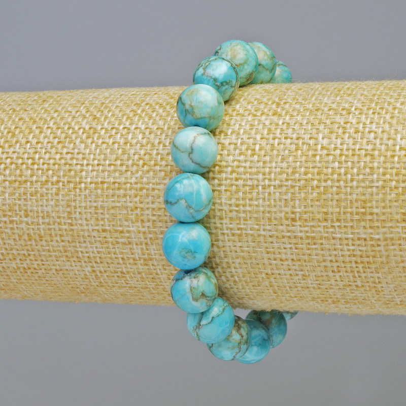Armband aus hellblauem Jaspis (synthetisch) glatte Kugeln, Durchmesser 10,5 mm ± (Stretch), Länge 18 cm+