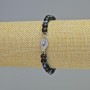 Schungit-Armband (einzeln) glatte Kugel, Durchmesser ca. 6 mm, Stretch-Armband, Länge ca. 18 cm, mit Einsätzen 'Auge'