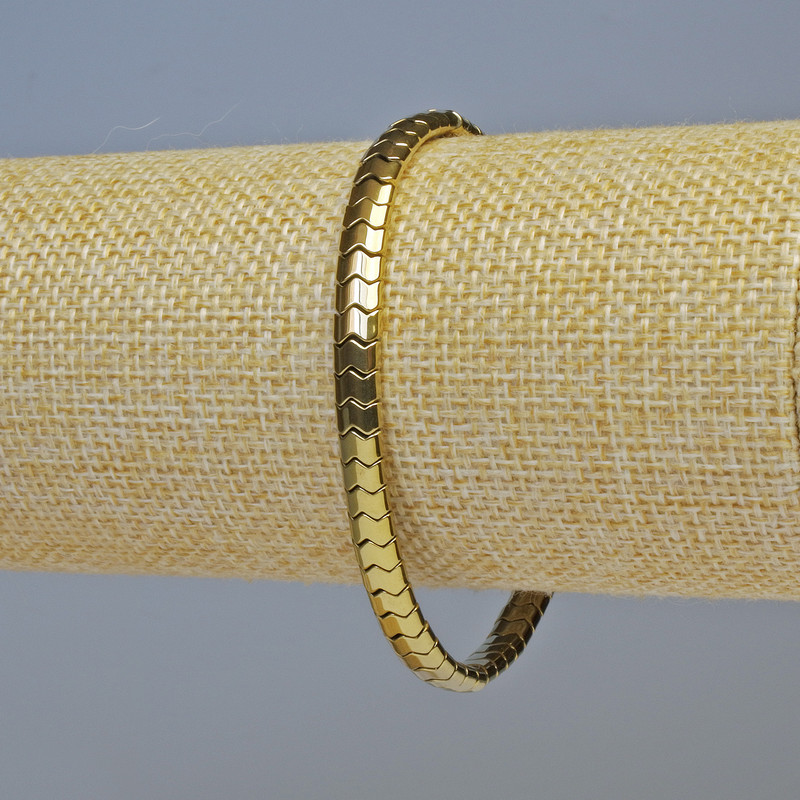 Hämatit-Armband Zickzack-Welle goldfarben, Durchmesser 5×4×3 mm, Länge ca. 18 cm, Stretcharmband