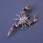 Brosche Skorpion mit rosa- und violetten Strasssteinen, silberfarbenes Metall, 47×25 mm +