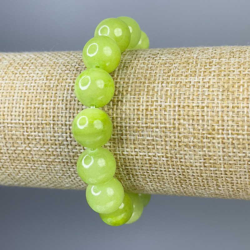 Armband aus Onyx mit glatten Kugeln 12 mm ±, Länge ca. 18 cm ±, Stretch