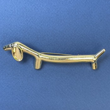 Brosche "Dackel" aus goldfarbenem Metall 21×85 mm+