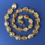 Citrin-Perlen, polygonale Form, 10–12×8 mm ±, mit Seed-Beads, Lochdurchmesser ca. 4 mm, auf Schnur, Länge ca. 38 cm