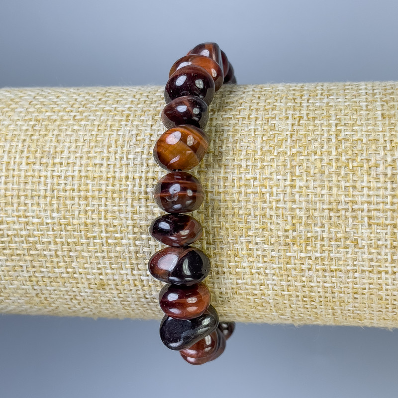 Armband aus Ochsenauge facettiert, Durchmesser 8–10 × 7–9 mm ±, Länge ca. 18 cm ±, Stretcharmband