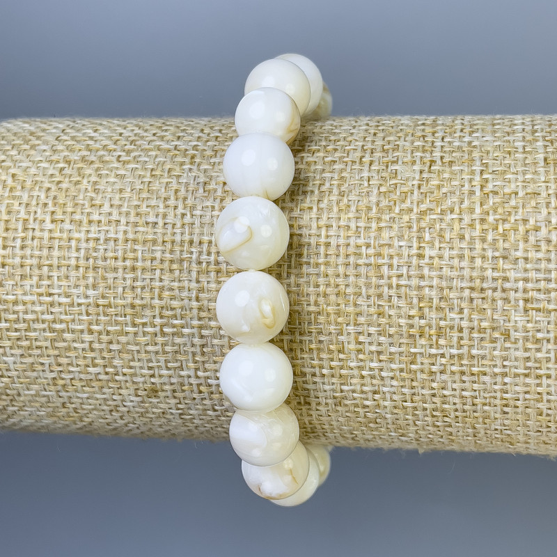 Armband aus Perlmutt, glatte Kugeln, Durchmesser 10 mm ±, Länge 18 cm ±, elastisch