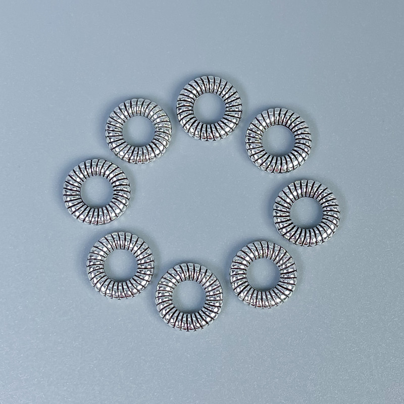 Silberfarbene Perle-Einlage, Ø 9 × 2 mm, Loch Ø ca. 4 mm, Verpackung 36 Stück