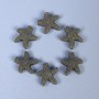 Perleinsatz Seestern in bronzefarbener Ausführung, Durchmesser 10 × 3 mm, Loch Ø 1,5 mm, Verpackung 11 Stück