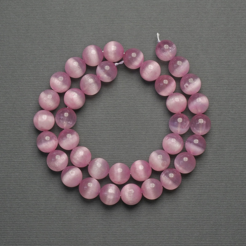 Rosa Katzenaugen-Perlen aus synthetischem Stein, glatte Kugeln, Durchmesser ca. 10 mm, auf einer Schnur, Länge ca. 39 cm