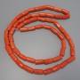 Korallenperlen orange, facettiert, 16–26×11–12 mm, Länge ca. 120 cm, auf einem Faden