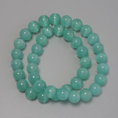 Katzenauge-Perlen Mintgrün, synthetischer Stein, glatte Kugel, Durchmesser 9,5 mm ±, auf Schnur, Länge 37 cm+