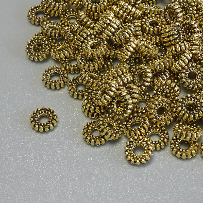 Goldfarbene Perlen-Einsätze – Metalloptik Gold, Abmessungen 6×2 mm, Lochdurchmesser 2 mm, Verpackung 20 g (≈109 Stück)