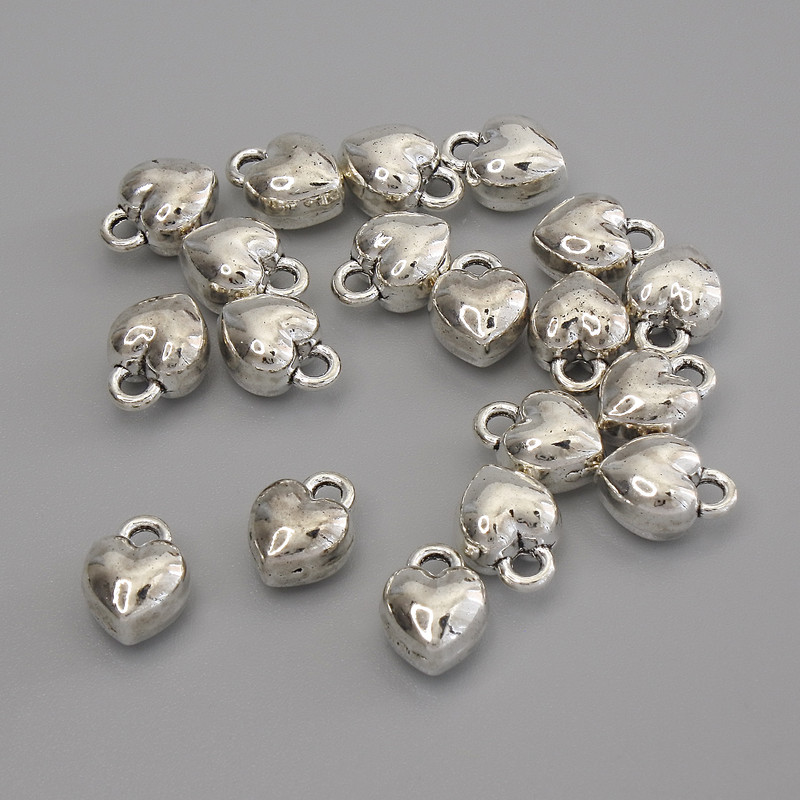 Anhänger Herz in silberfarbener Metallfarbe, Durchmesser ca. 9×7 mm, Verpackung 18 Stück