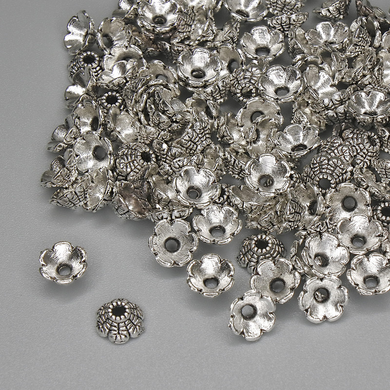 Perlenkappe silberfarben, Durchmesser 6×1 mm ± Loch Ø 1,5 mm ± Verpackung 20 g (~122 Stück)