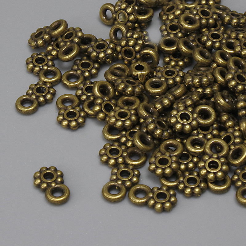 Bronzefarbener Anhänger, Durchmesser ca. 7×4,5 mm, Loch Ø ca. 1,5 mm, Verpackung 84 Stück