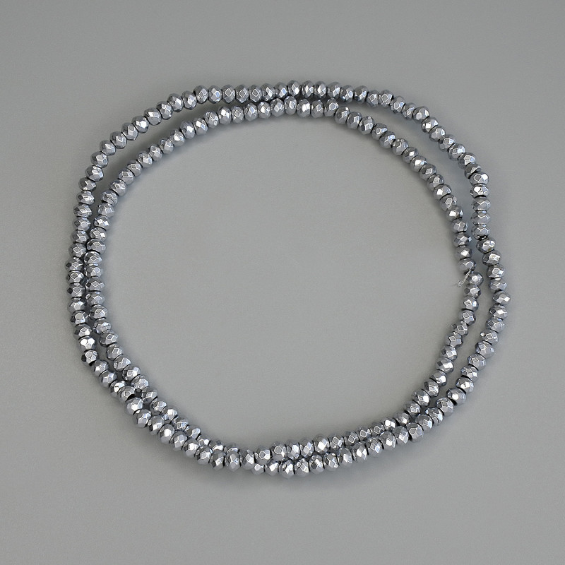 Hämatit-Perlen silberfarben, facettiertes Rondell 3×2 mm ± auf Fadenschnur, Länge ca. 40 cm