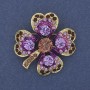 Brosche-Anhänger Kleeblatt mit violetten Strasssteinen und goldfarbenem Metall, Durchmesser 35 mm +