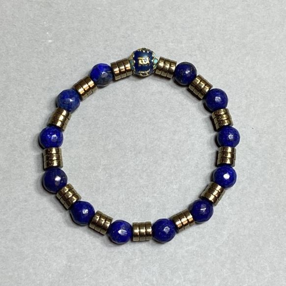 Lazurit-Armband, facettierte Kugeln 8 mm ±, mit Metall-Einlagen, Länge 18 cm, Stretch