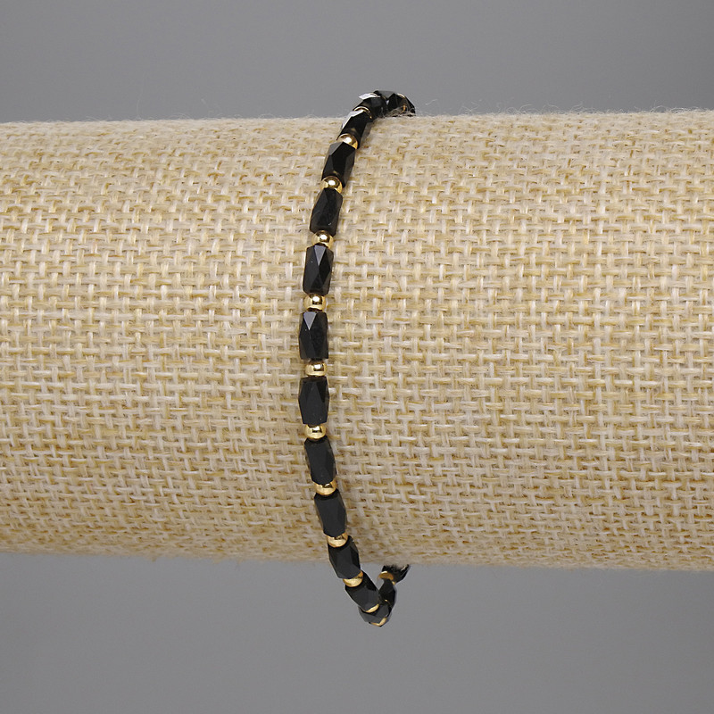 Armband aus schwarzem tschechischem Kristall, facettierte Zylinder 5×3 mm ±, Kugeln 2 mm ±, Länge 18 cm, Stretch