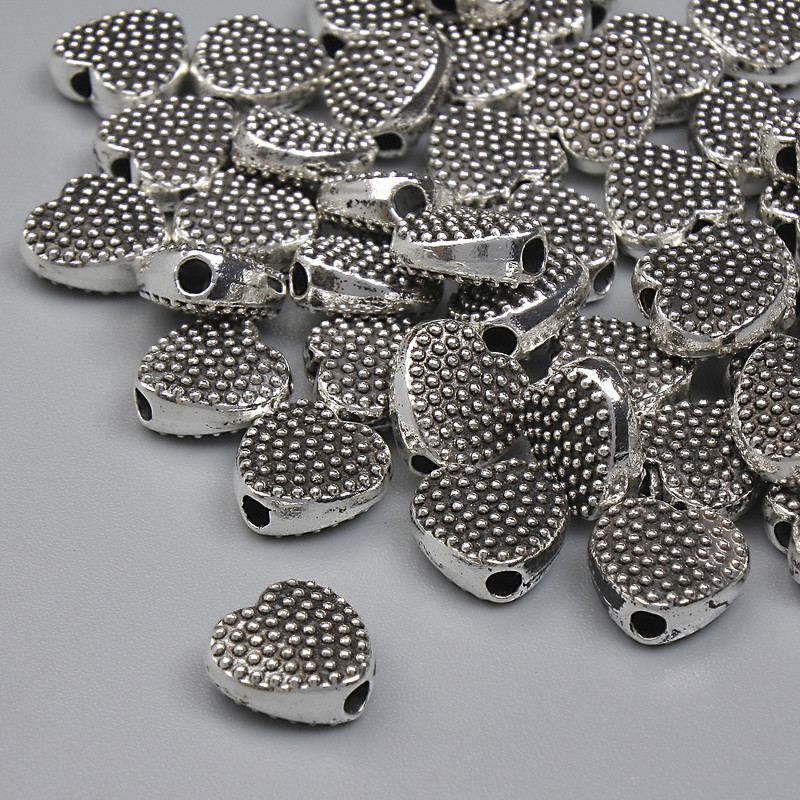 Herz-Einlegeperle, silberfarben, Durchmesser ca. 7 mm, Lochdurchmesser ca. 1,3 mm, Verpackung 20 g (~40 Stück)