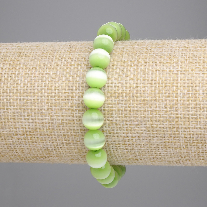 Armband aus Katzenauge in Salatgrün, glatte Kugeln, Durchmesser ca. 8 mm, Länge ca. 18 cm, Stretch