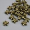 Sternförmiger Perleinsatz in antikbronzefarbenem Metall, Durchmesser 6 × 2,5 mm, Lochdurchmesser 1,5 mm, Verpackung ca. 25 Stück