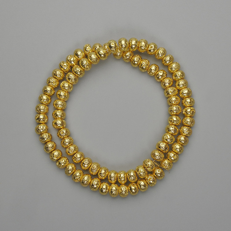 Lavaperlen aus Lava mit goldfarbener Metallbeschichtung, poröses Rondell 6×4,5 mm, Länge 38 cm ±