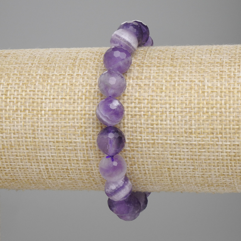 Armband aus facettierten Amethystkugeln, Durchmesser ca. 10 mm, Länge ca. 18 cm, Stretch