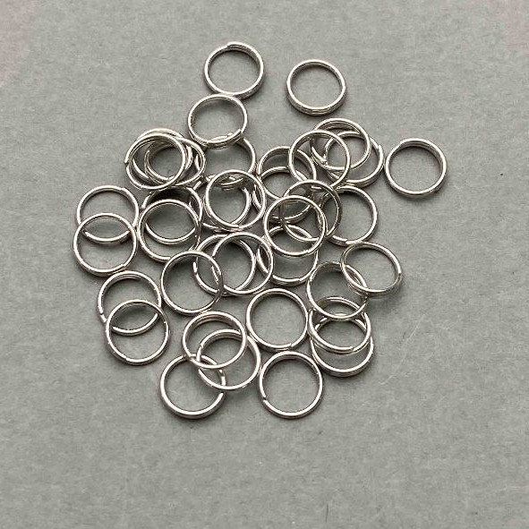 Schmuckzubehör: Sprungring, Federtyp, Ø 7 mm, silberfarbenes Metall, Verpackung 1 kg