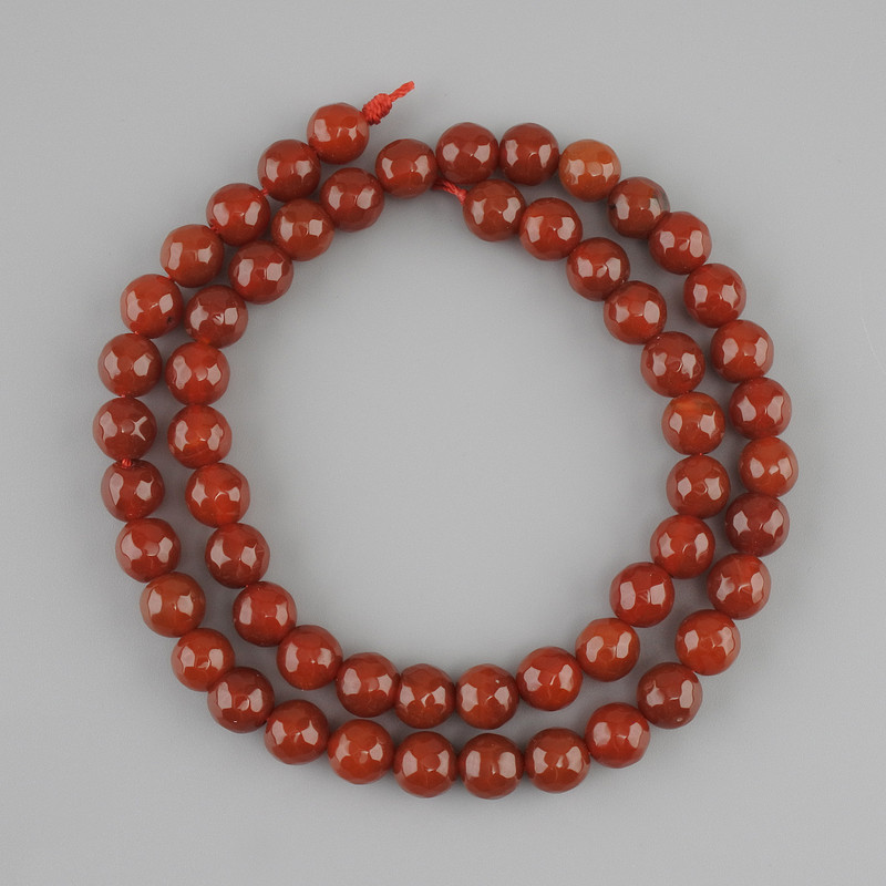 Karneol-Perlen, facettierte Kugeln, Durchmesser ca. 8 mm, Länge ca. 42 cm, auf einem Faden