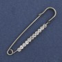 Brosche mit Nadel – weiße Strasssteine, 60 × 12 mm ±, silbernes Metall
