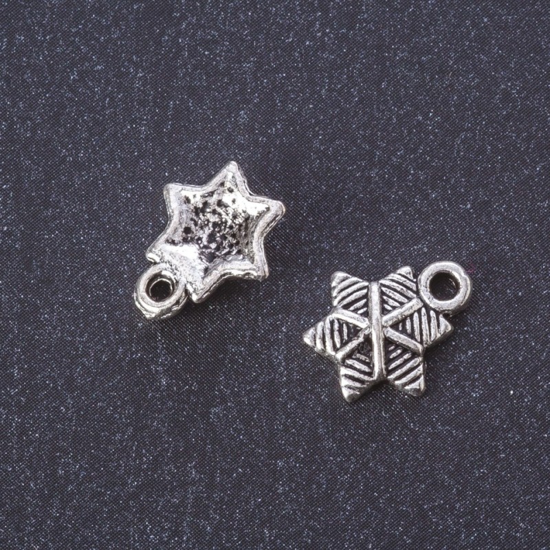 Anhängerzubehör 'Weihnachtsstern', Metallfarbe Silber, 13×11 mm, Verpackungseinheit 20 g, ca. 35 Stück