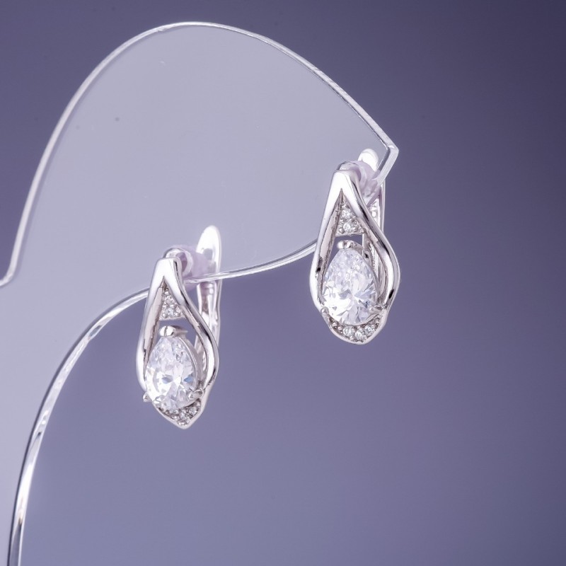 Ohrringe Xuping mit weißen Zirkonen 16×9 mm Rhodium-Beschichtung