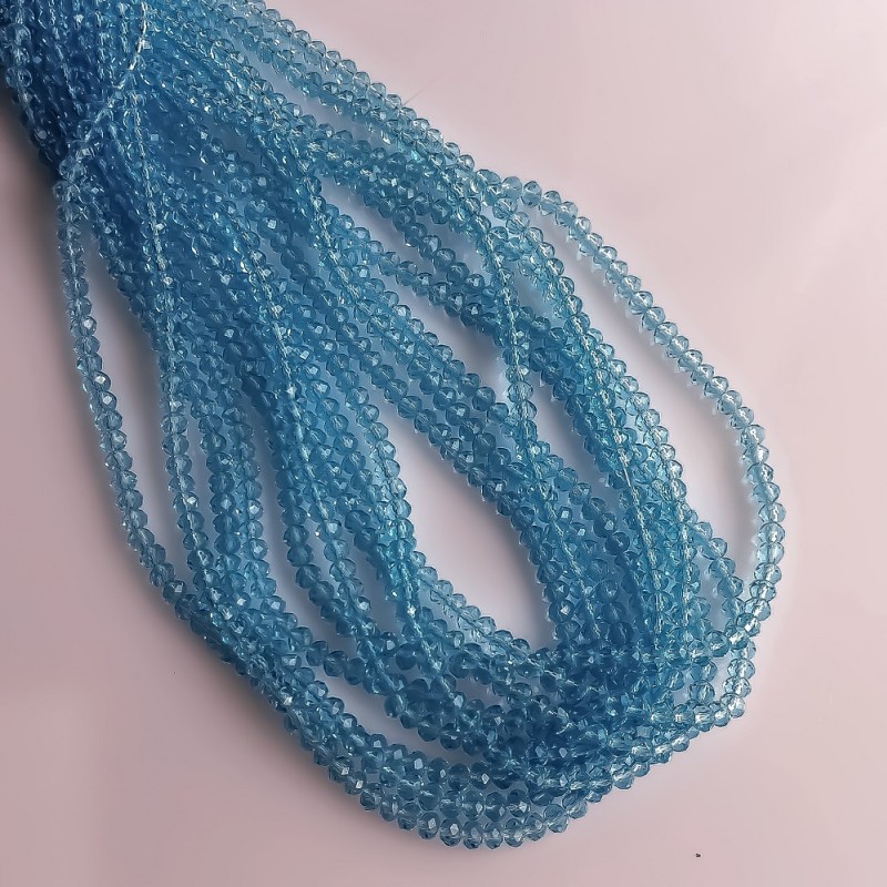 Perlen aus tschechischem Kristall, transparent hellblaues Rondell, Durchmesser 3,5×2,5 mm, Fadenlänge ca. 40 cm