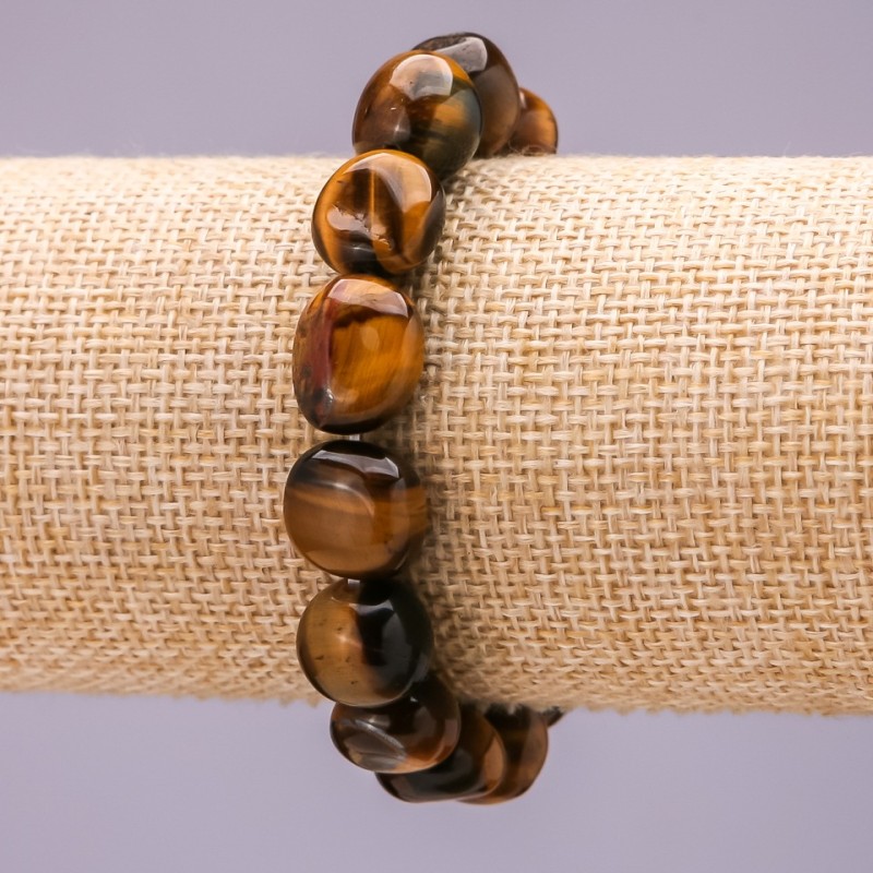 Elastisches Armband aus Tigerauge, Facettierung ca. 12×8 mm