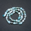 Larimar-Perlen, facettiert, 6×10 mm, auf Schnur, Länge 39 cm