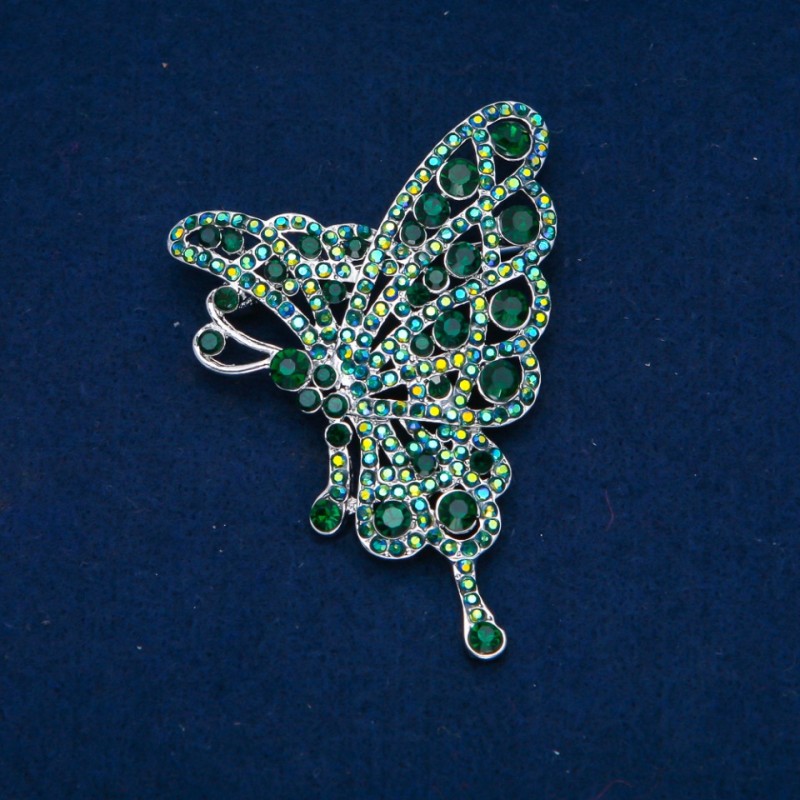Brosche „Schmetterling“ mit grünen und benzinfarbigen Strasssteinen, goldfarbenes Metall 75×50 mm +