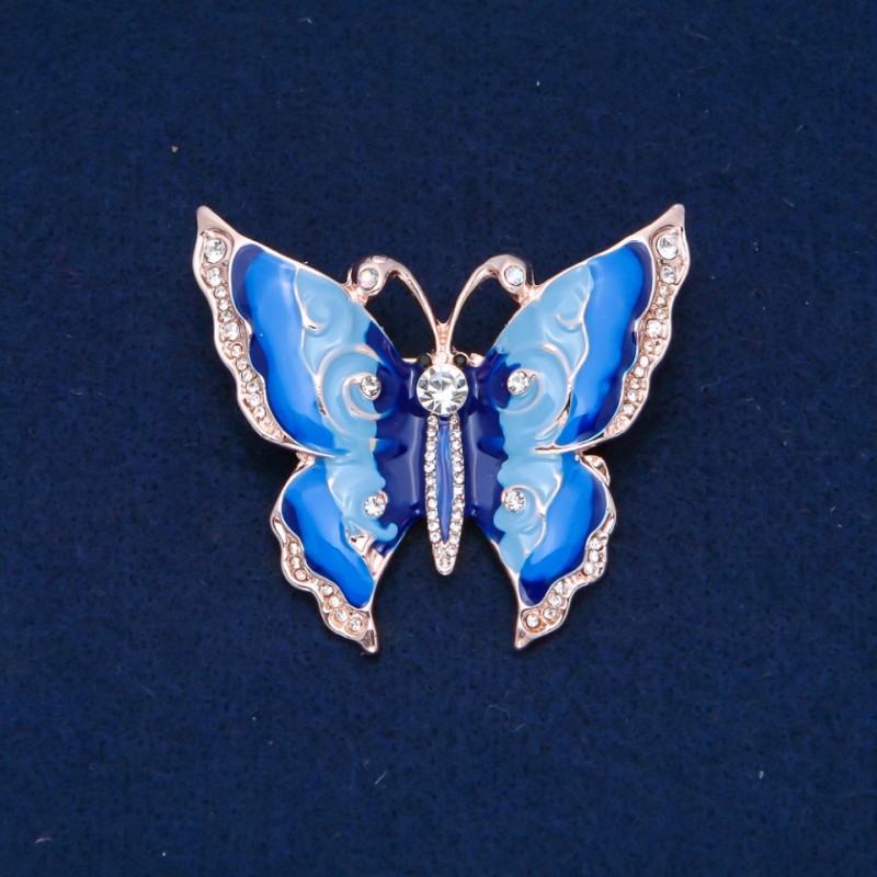 Brosche Schmetterling mit weißen Strasssteinen, hellblaue und dunkelblaue Emaille, goldfarbiges Metall 47×52 mm +