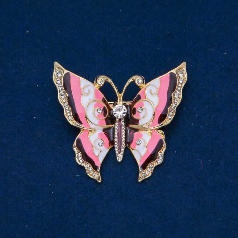 Brosche 'Schmetterling' aus goldfarbenem Metall, Emaille, weiße Strasssteine 46 × 52 mm +
