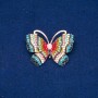 Brosche Schmetterling aus goldfarbenem Metall, mit vielfarbigen Strasssteinen und einer Glasperle 34 × 45 mm +