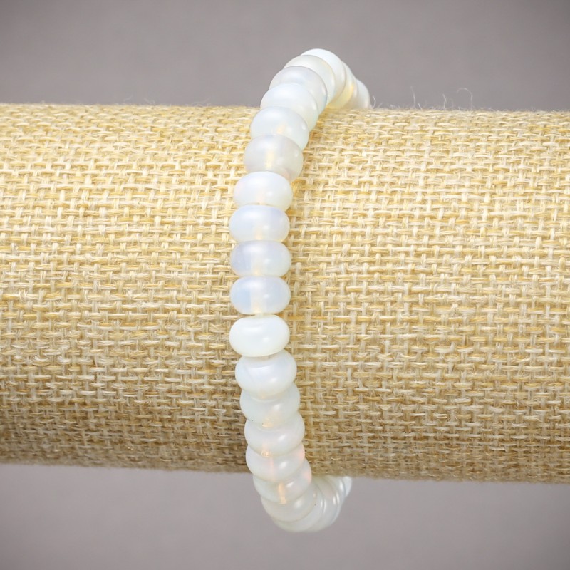 Elastisches Armband mit synthetischem Mondstein, glatte Rondellen, Maße ca. 8×5 mm, Länge ca. 18 cm+
