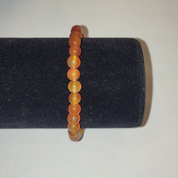Stretcharmband aus Karneol, glatte Kugeln, Durchmesser ca. 6 mm