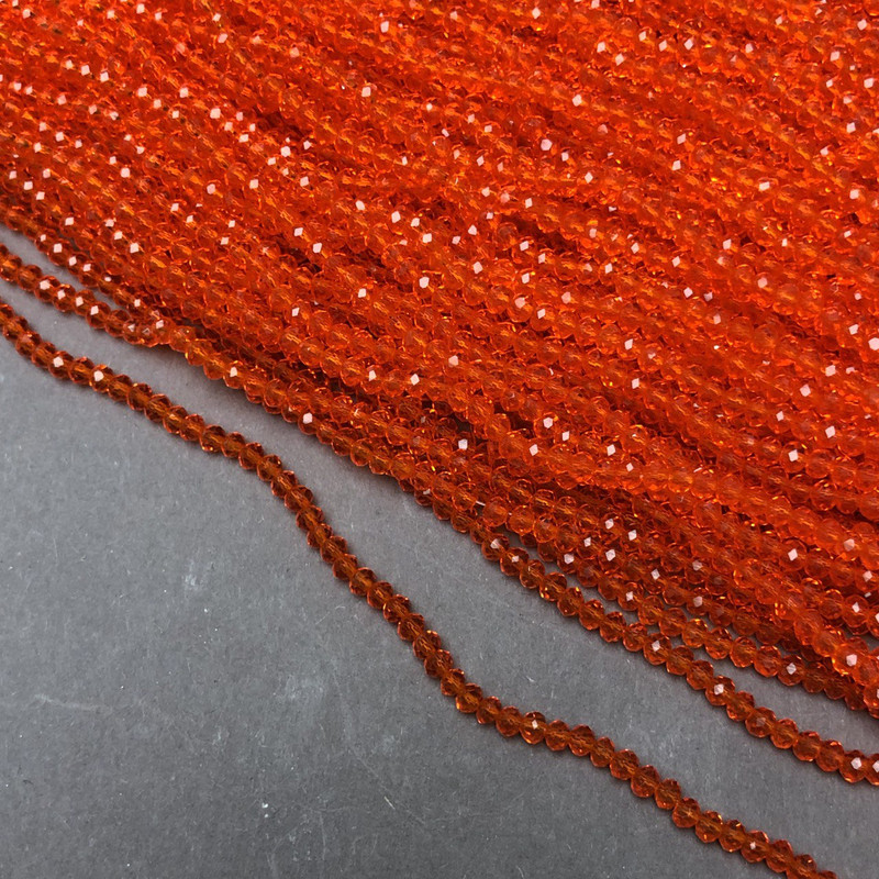 Perlen aus tschechischem Kristall auf Schnur – rot-orange-transparentes facettiertes Rondell, Durchmesser ca. 3 x 2,5 mm, Länge 36–38 cm +