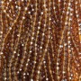 Perlen aus tschechischem Kristall auf Schnur – braun-transparentes facettiertes Rondell, Durchmesser ca. 6×5 mm, Länge ca. 40–42 cm