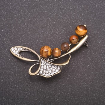 Brosche mit Tigerauge – Ästchen, bronzefarbenes Metall, 58 × 36 mm