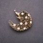 Brosche mit rosa Strasssteinen, 42 × 42 mm, Gelbmetall